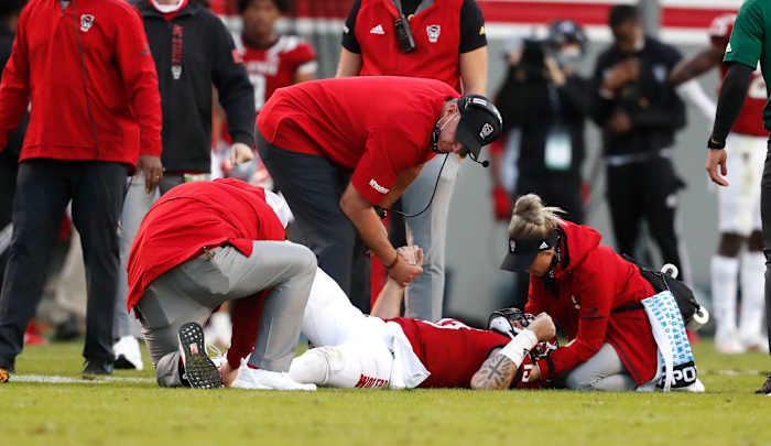 Devin Leary gets medical attention after his injury late in the third quarter